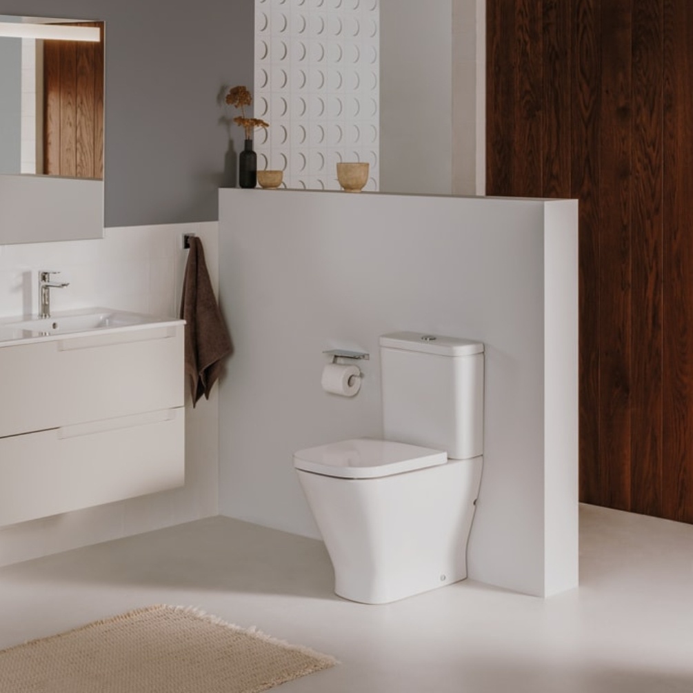 Lifestyle image of the Roca The Gap Square Close Coupled Back to Wall Comfort Height Toilet in a bathroom